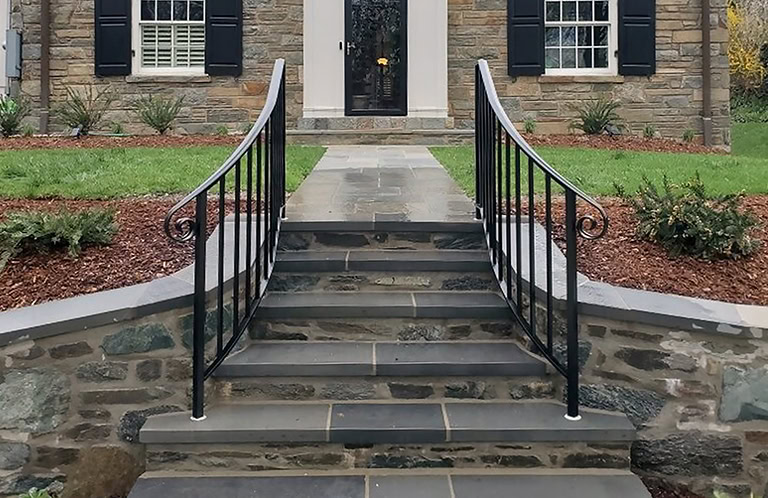 black aluminum picket railing with custom curl