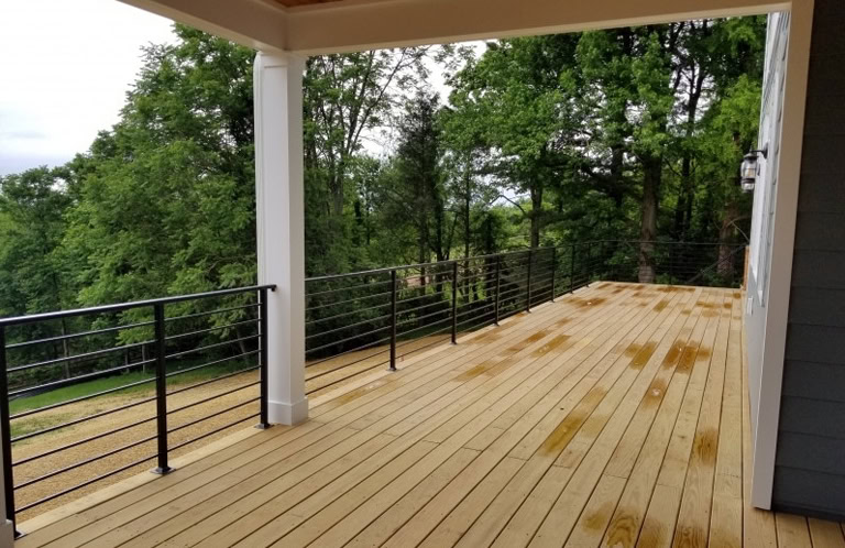 Black steel welded horizontal railing for wood deck