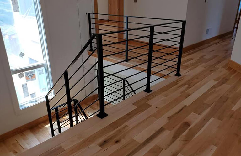 black steel welded horizontal stair railing